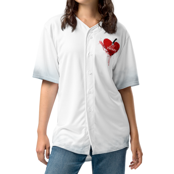 Female model wearing the Still Tickin' buttoned-down jersey by Nopaune, front view showing fit and graphic.
