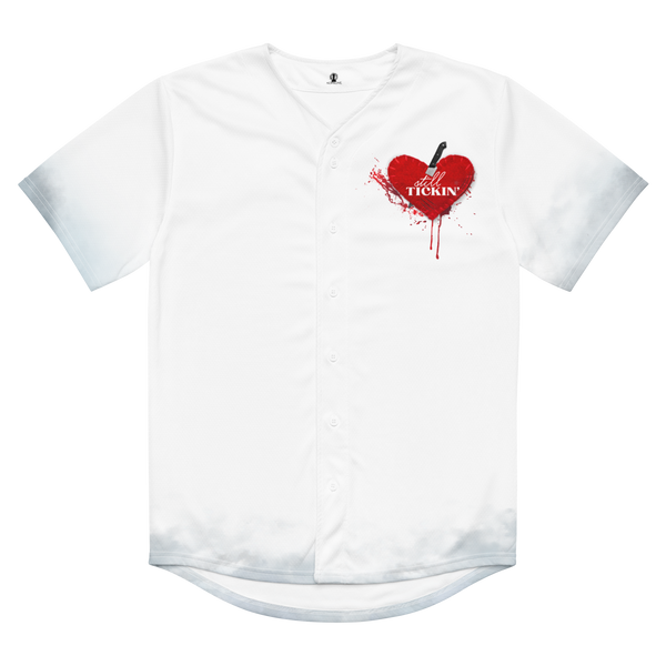 Front view of the Still Tickin' buttoned-down jersey by Nopaune, white fabric with red “Still Tickin'” graphic on front
