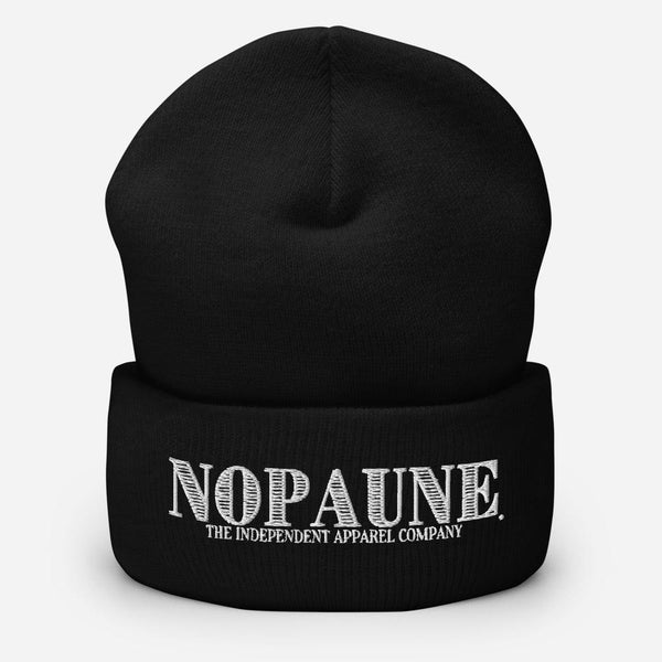 A black, cuffed beanie displaying the words "Nopaune. The Independent Apparel Company" in white embroidery.