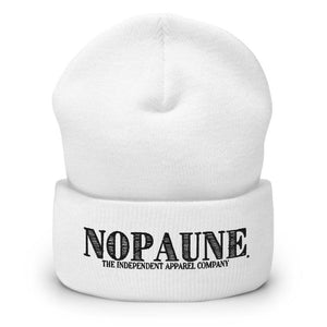 A white, cuffed beanie displaying the words "Nopaune. The Independent Apparel Company" in black embroidery.