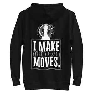 Display of a black hoodie. Printed on the back of the hoodie, in white, are the words "I make my own moves". Above those words is the Nopaune logo (a chess pawn with a "not allowed sign" laid over it, surrounded by spokes/rays and broken infinity signs).